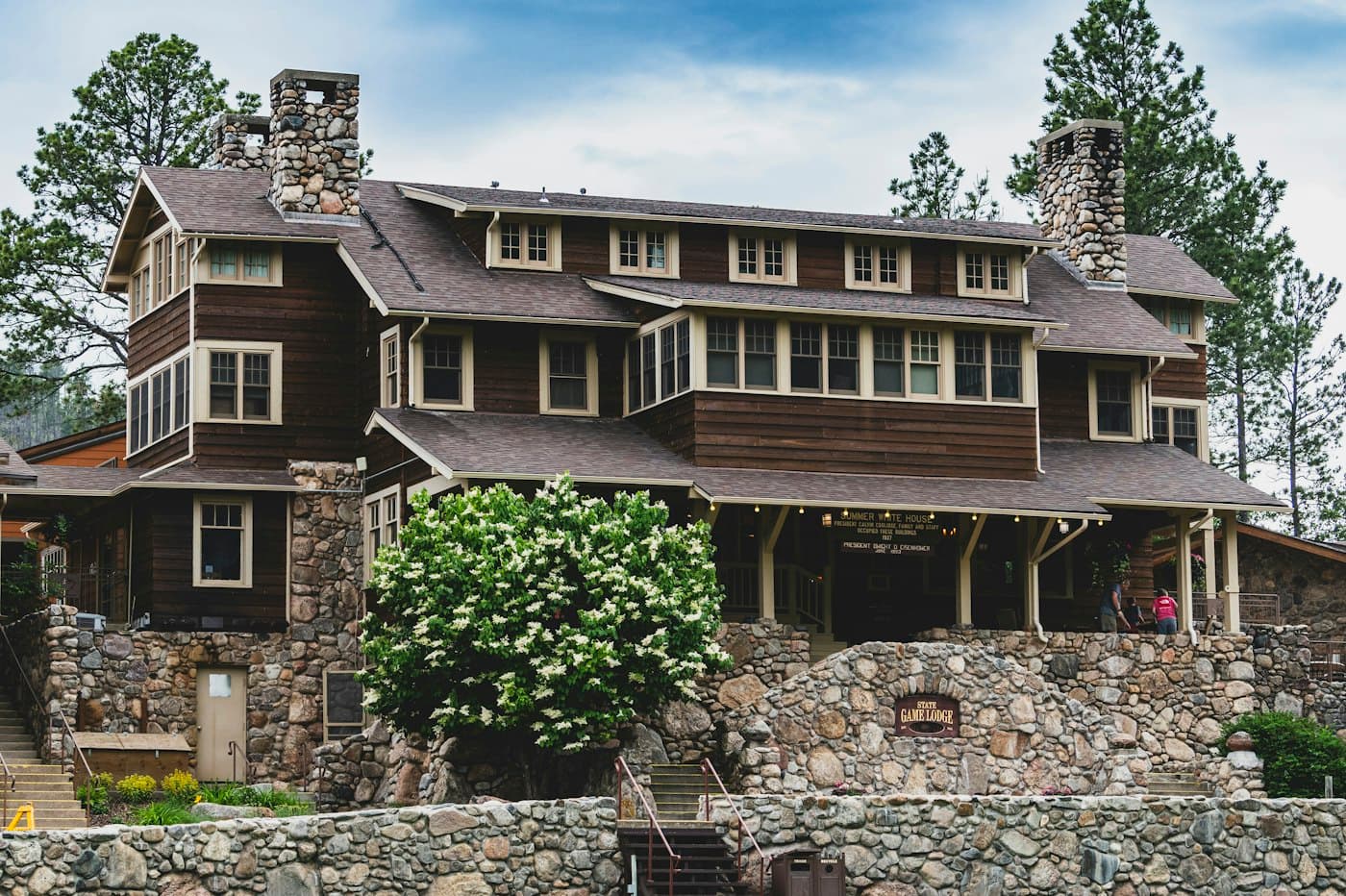 Large home with stone foundation walls