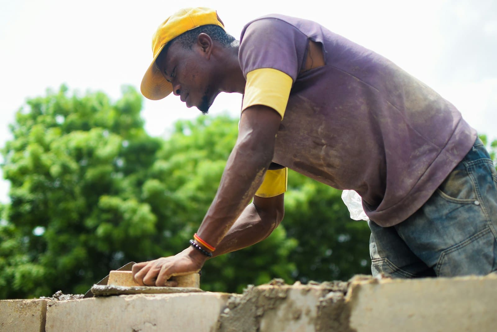 Bricklayer laying a new wall