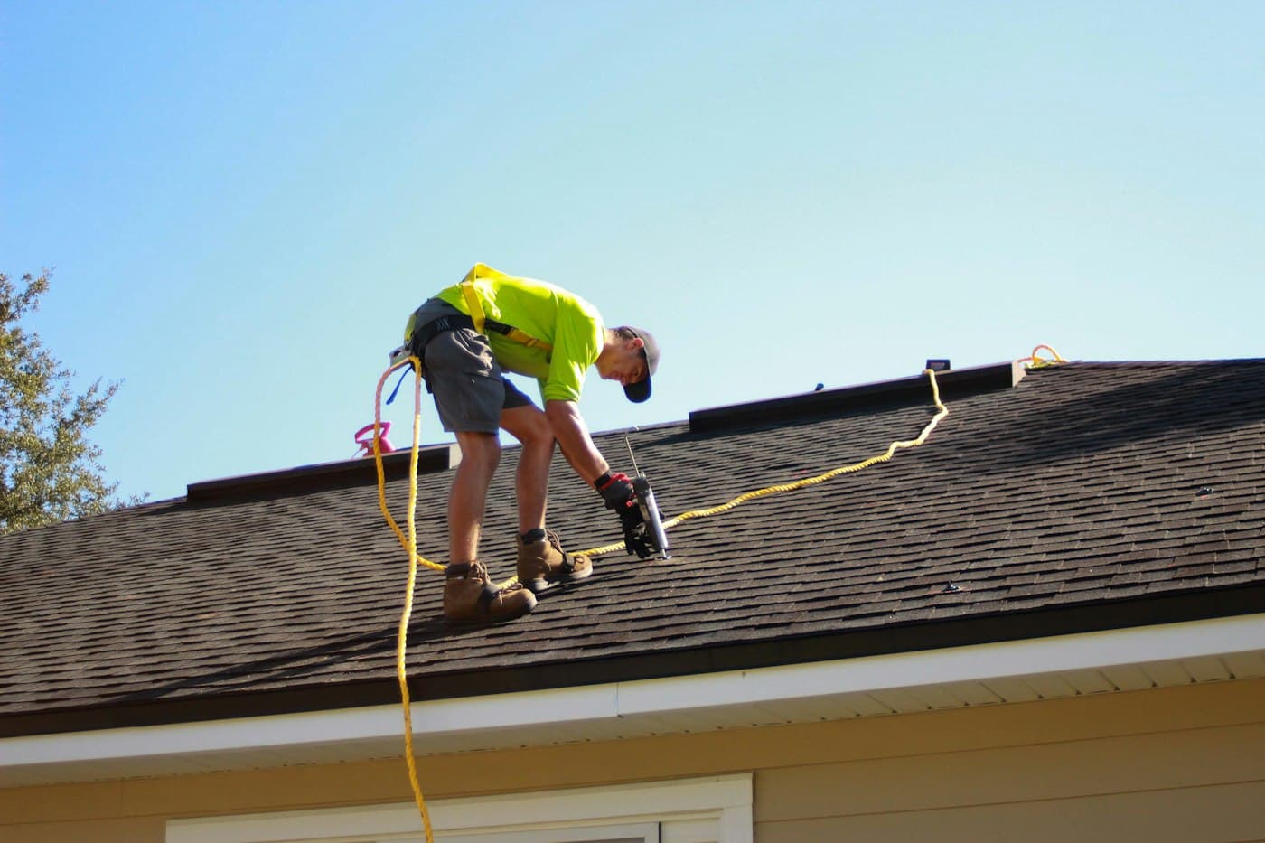 TW Construction crew working on a roof